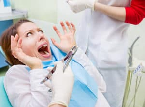 woman afraid of dentist